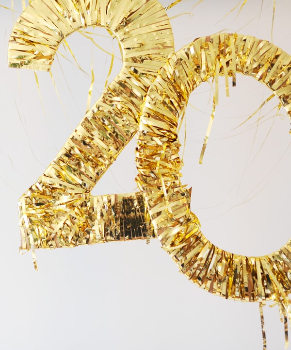 Gold fringe wrapped numbers