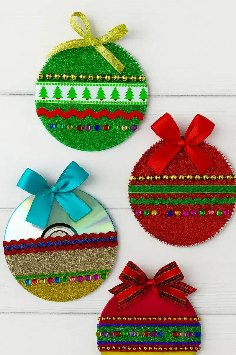 Repurposed CDs Turned into Stunning Holiday Decor beautiful christmas arrangements made with old cds 8