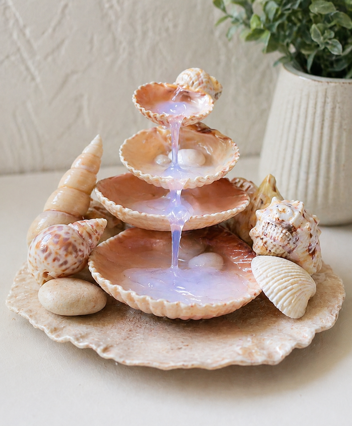 Seashell Fountain Built Around a Small Pump beautiful fountain ideas made with seashells and silicone 4