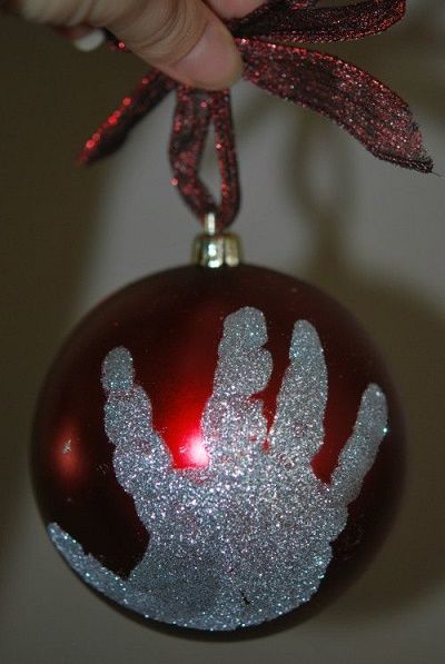 Christmas decoration with finger and hand print to remember later