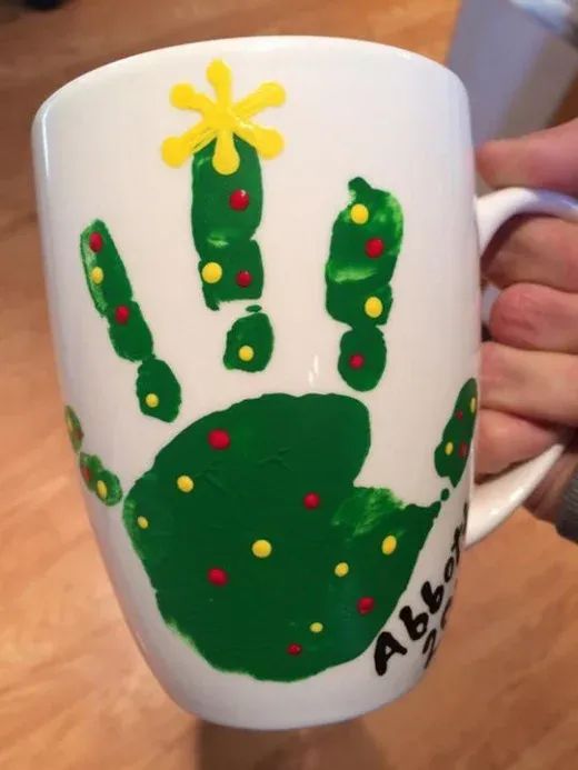 Christmas decoration with finger and hand print to remember later