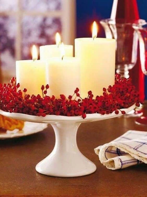 decorating a christmas table with candles 11