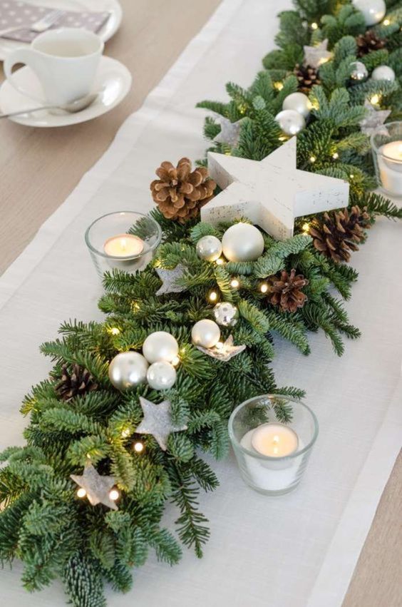 decorating a christmas table with candles 8