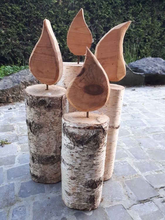 decorative candles crafted from wooden logs 1