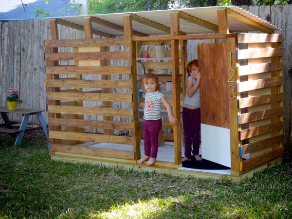 small wooden outdoor playhouse