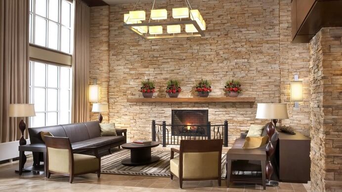 15+ Amazing Living Room Interiors With Stone Walls