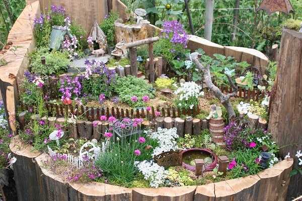 tree stump fairy gardens 11