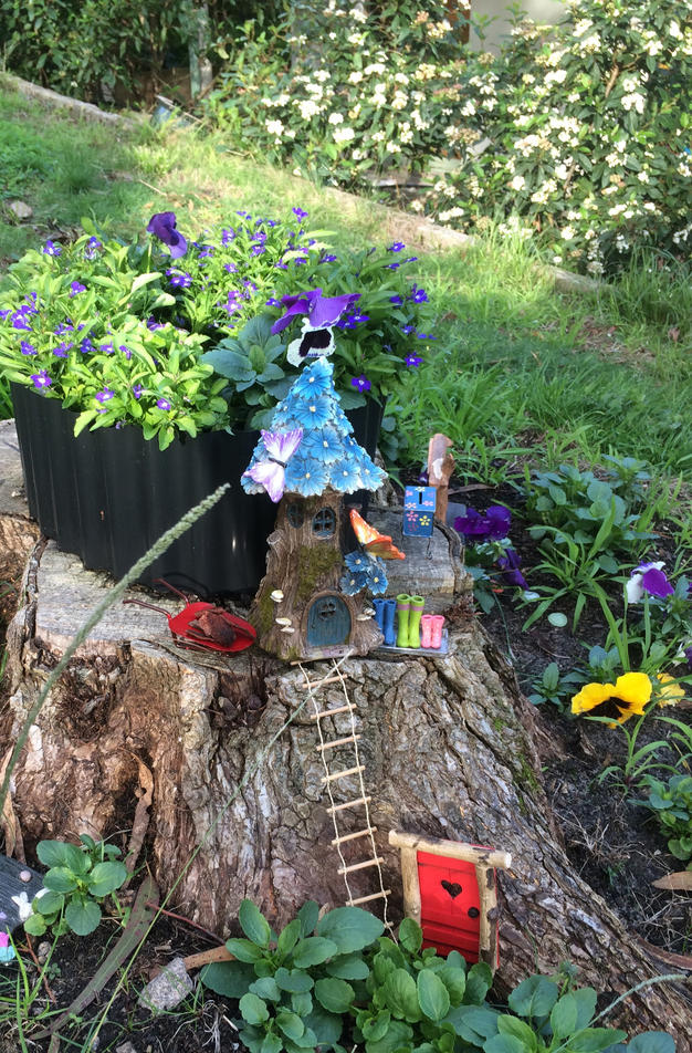 tree stump fairy gardens 15