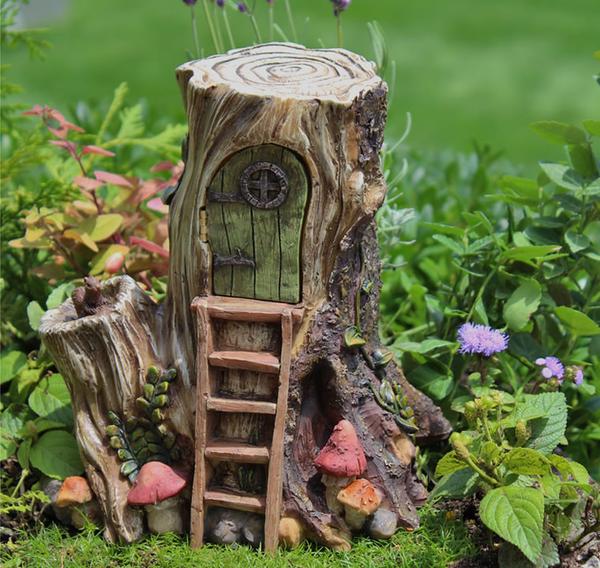 15+ Awesome Tree Stump Fairy Gardens