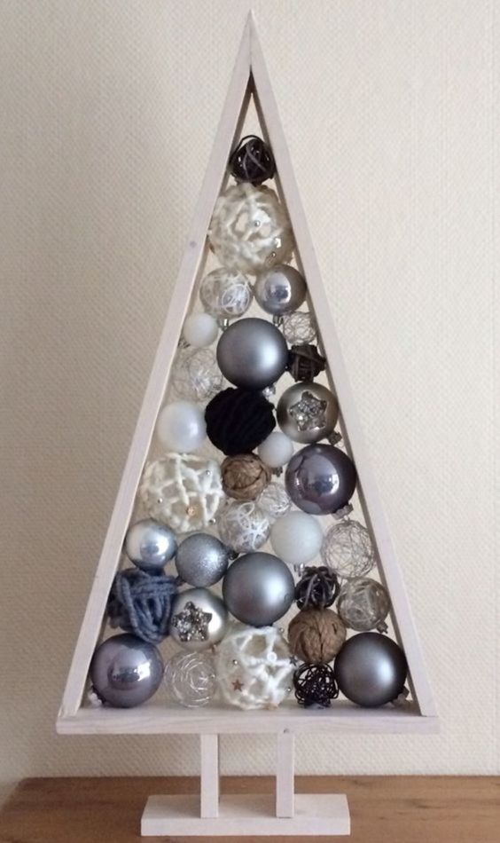 Triangular wooden Christmas tree with Christmas balls