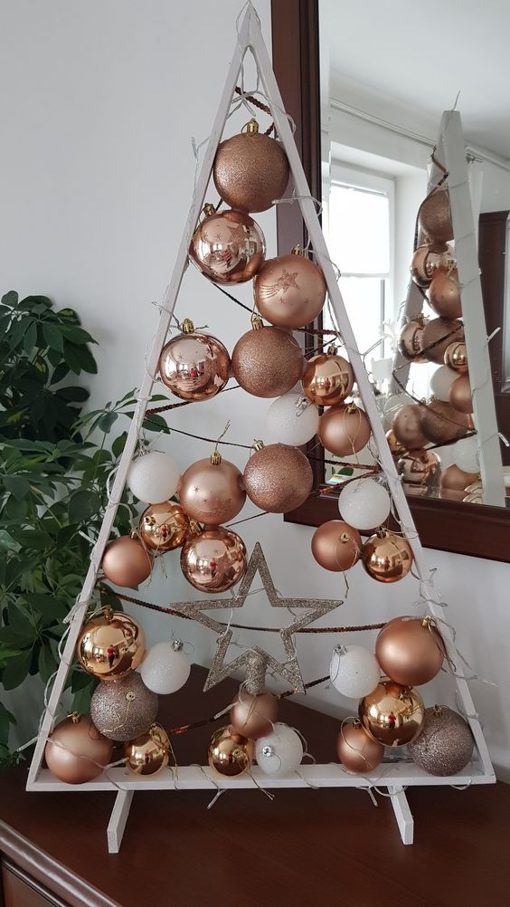 Triangular wooden Christmas tree with Christmas balls