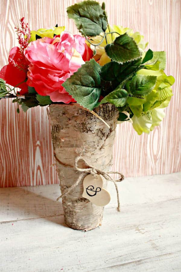 20+ Wonderful Decorative Vases Made From Tree Stump