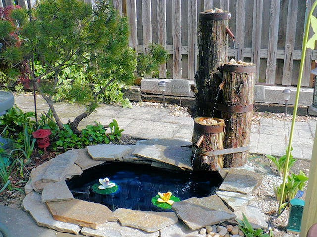 15+ Fantastic Wooden Garden Fountains